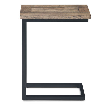 The Skyler - C Side Handcrafted Table features a rectangular wooden top and a black metal C-shaped frame, designed to easily slide under furniture for added convenience.