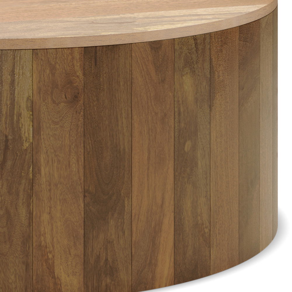 Close-up view of the Millbury Drum Coffee Table in natural finish, featuring a round design with vertical wooden planks and a smooth surface.