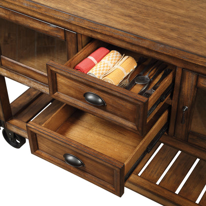 The Kadri - Kitchen Cart - Distressed Chestnut features two open drawers—top with rolled kitchen towels and utensils, bottom empty—a slatted lower shelf, and metal handles for easy mobility.