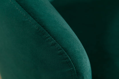 Close-up of the Velvet Fabric Swivel Accent Armchair Barrel Chair, highlighting the soft green velvet texture and detailed stitching along its curved armrest with a powder-coated metal ring.