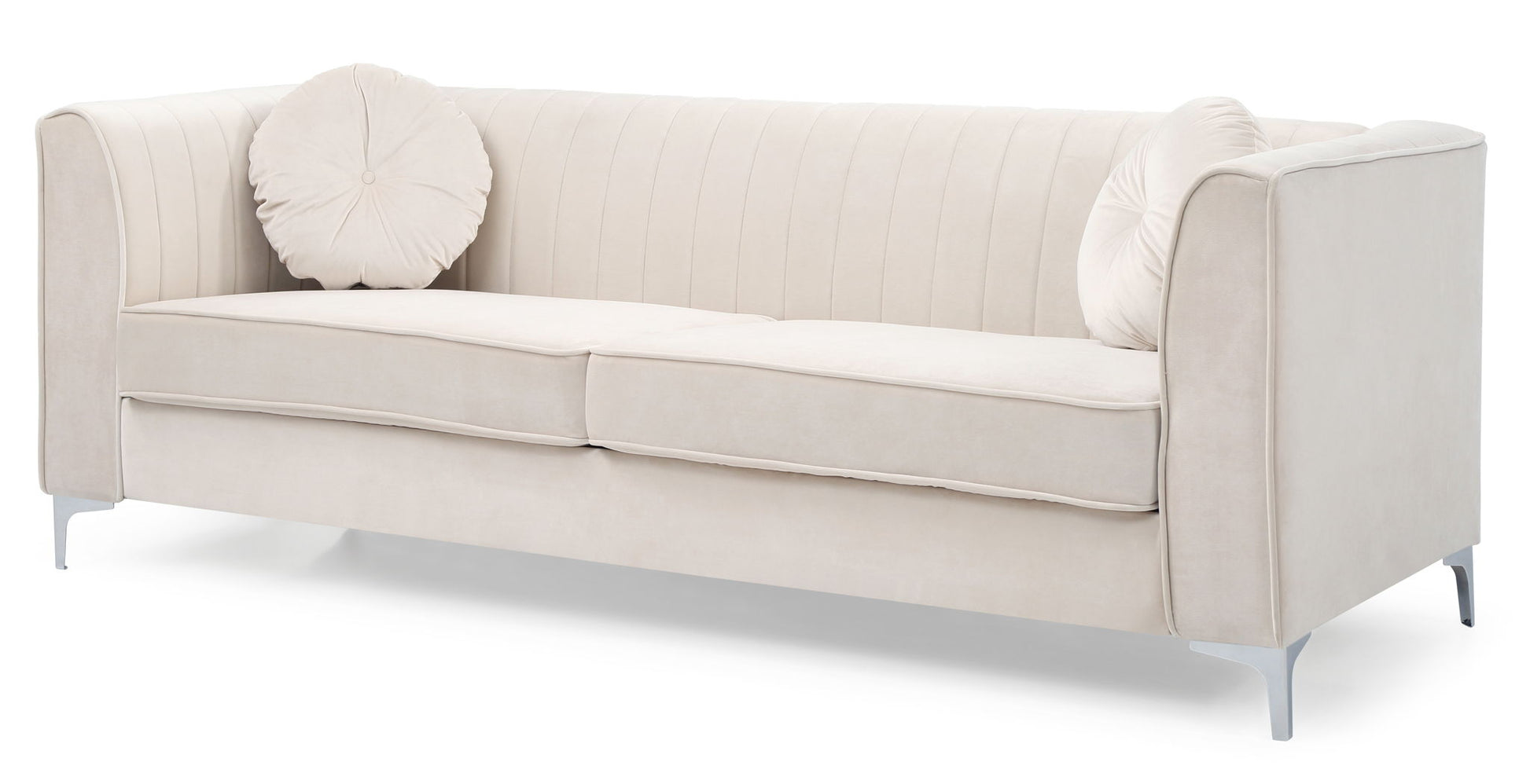 The Delray Micro Suede Sofa features a modern beige design with vertical stitching, two seat cushions, two round tufted pillows, and sleek silver metal legs.