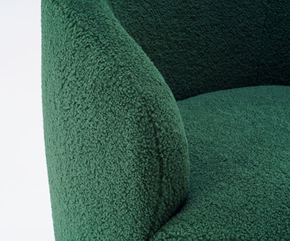 Close-up of the Teddy Fabric Swivel Accent Armchair Barrel Chair, showing its green boucle upholstery and curved arm. The soft, cozy texture stands out against the plain white background. Features a powder-coated metal ring base.
