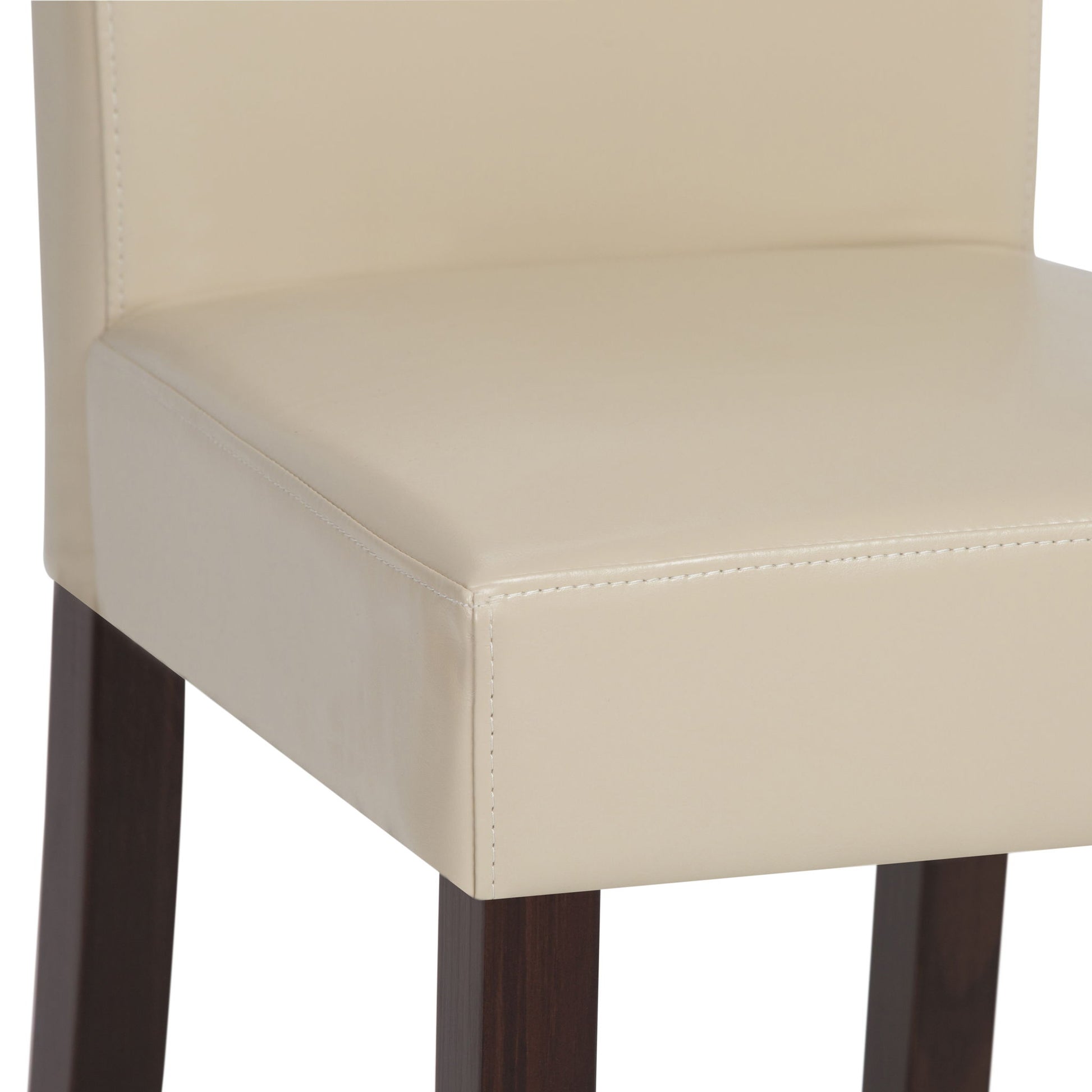 Close-up of the Acadian Upholstered Parson Dining Chair (Set of 2), featuring beige upholstery, dark wooden legs, and detailed stitching that highlights the smooth texture of the seat and backrest.