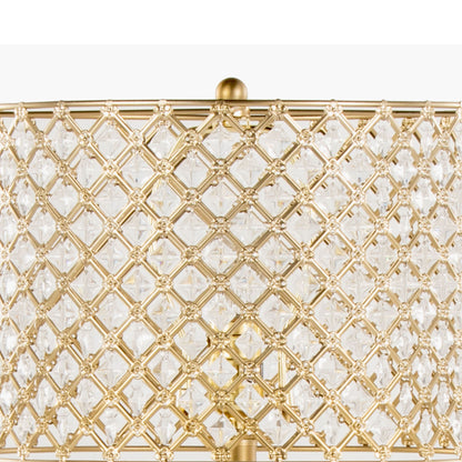 A close-up of the Topaz - Contemporary Table Lamp’s gold metal lampshade, featuring a diamond-patterned lattice design with clear crystal accents, highlights its intricate and decorative details.
