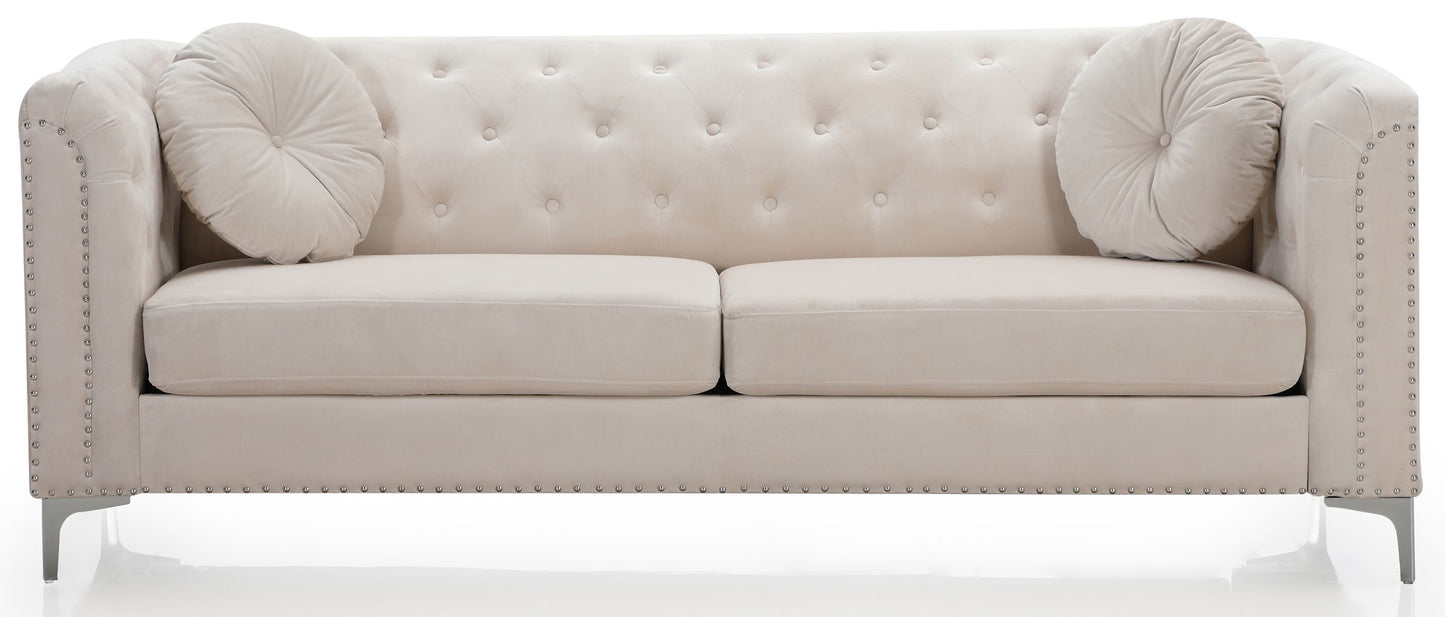 The Elegant Contemporary Sofa features light beige velvet upholstery, tufted design, two round cushions, metal legs, and nailhead trim on the armrests and base.