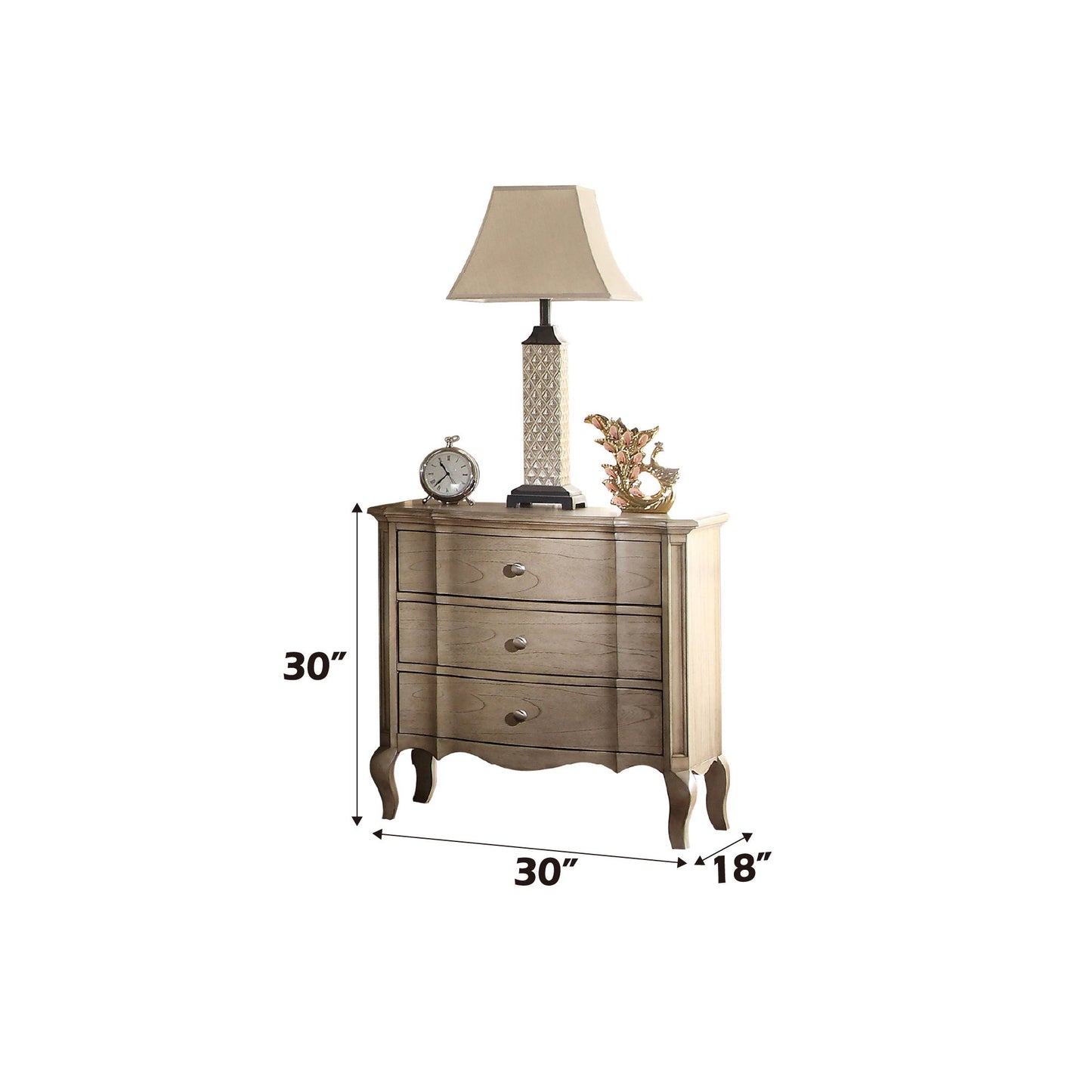 The Chelmsford Nightstand, featuring classic and modern design, has three drawers with silver knobs, curved legs, and measures 30"W x 18"D x 30"H. Its spacious top can hold a lamp, clock, and decorative items.