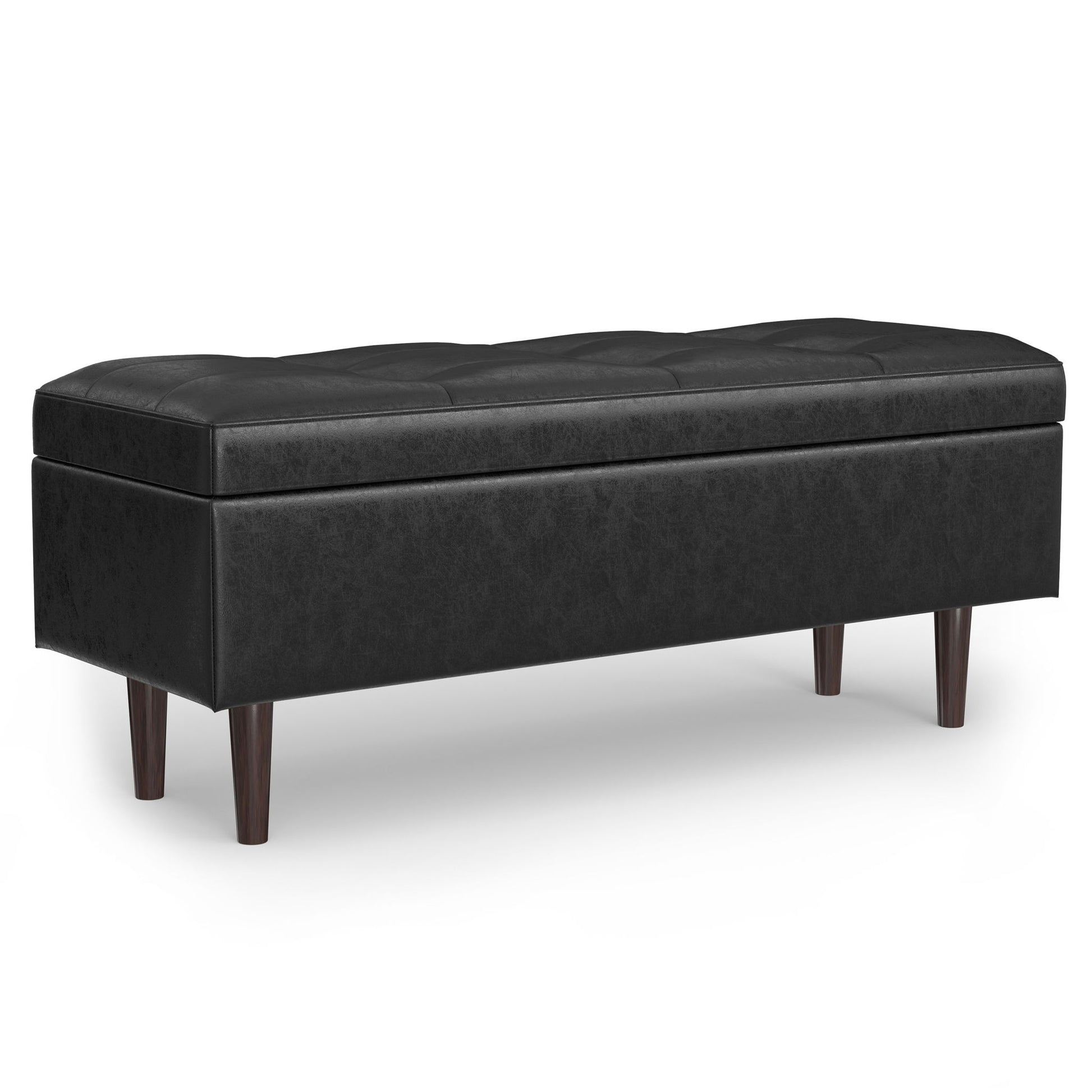 The Shay Large Square Coffee Table Storage Ottoman features black upholstery, a tufted top, and four dark wood legs in a mid-century style, displayed against a white background.