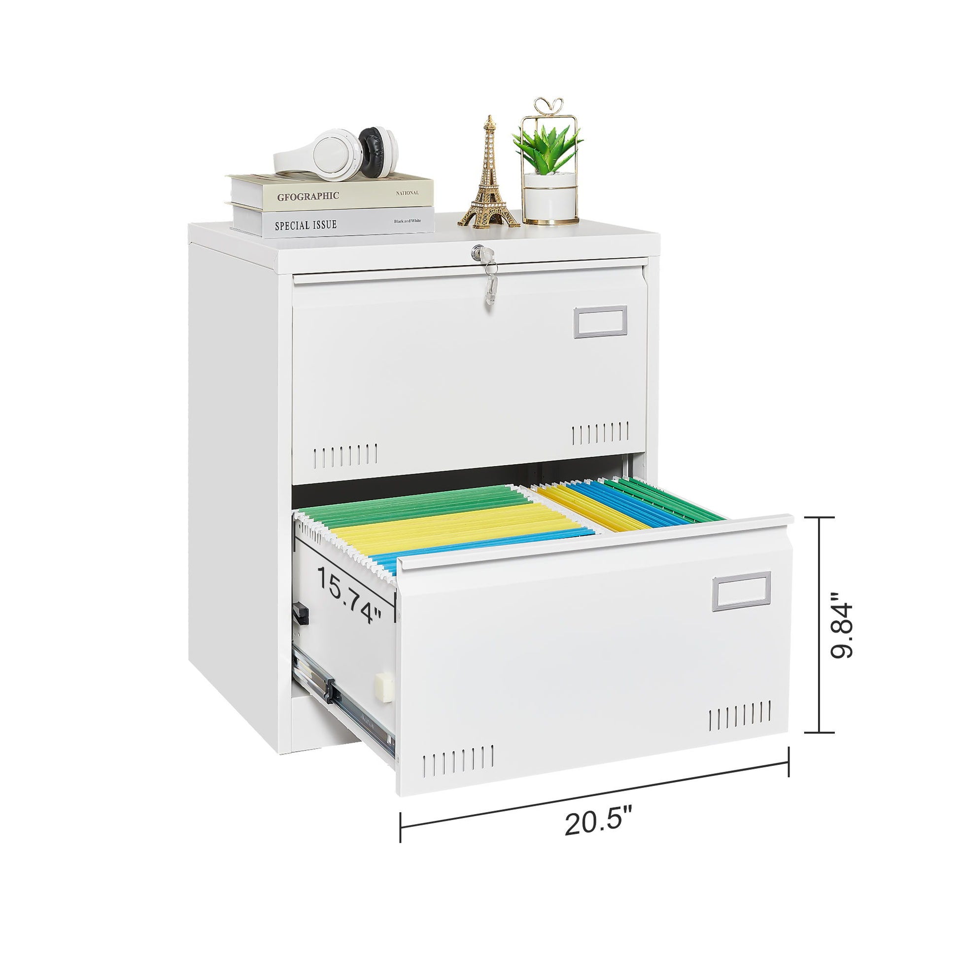 The Filing Cabinet Lateral File Cabinet 3 Drawer is shown in white with one open drawer of organized files. It measures 20.5" wide and 9.84" tall, and its top holds books, headphones, a plant, and an Eiffel Tower decor piece.
