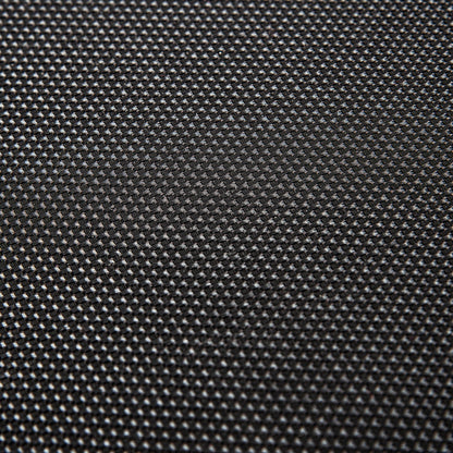 Close-up of the Kangle Store Trampoline With Handle's black, textured surface featuring a small, repeating grid pattern. Lighting accentuates the raised design, giving it a woven look and adding depth to the trampoline’s appearance.