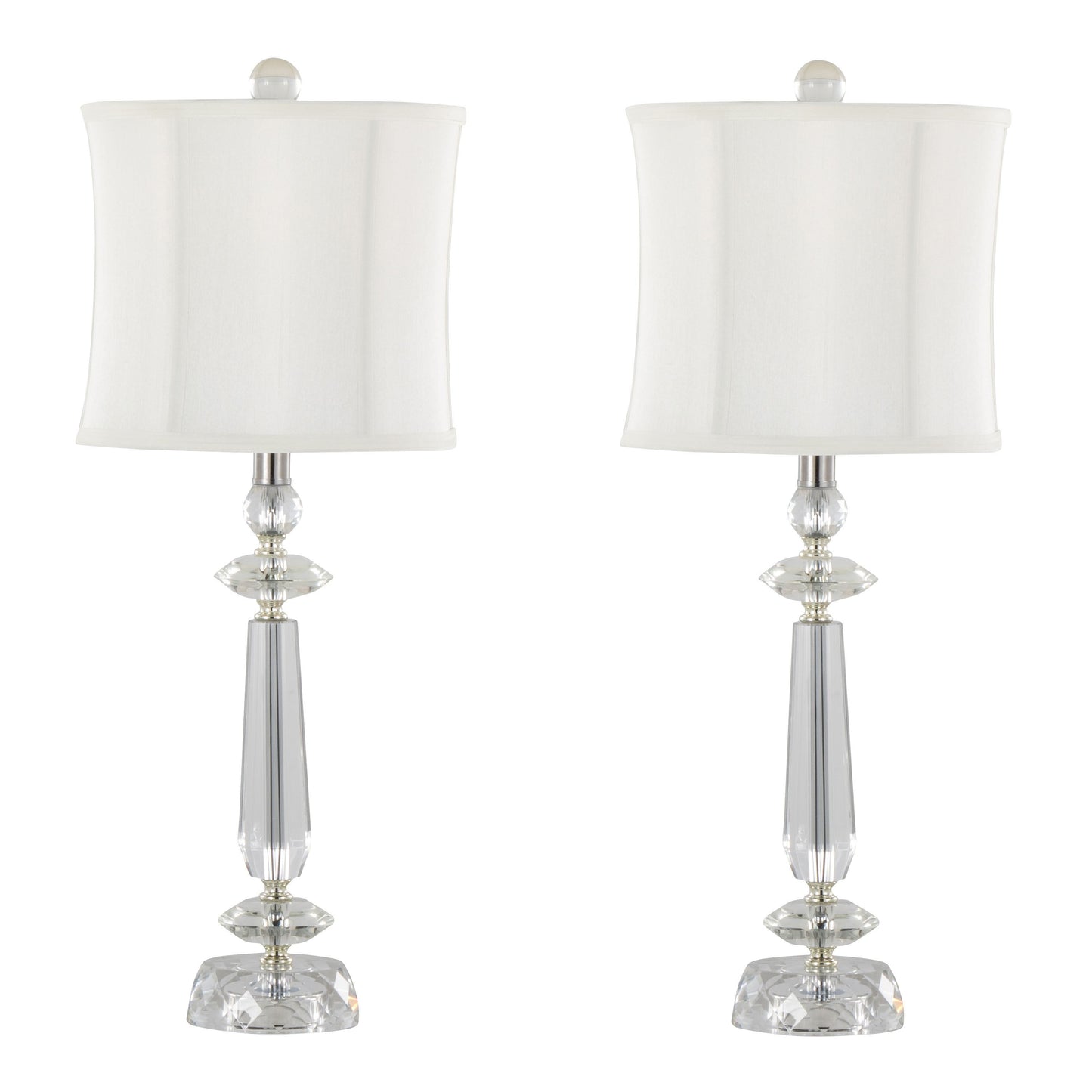 The Karat set includes two contemporary table lamps with sleek, tapered designs featuring clear crystal bases, chrome accents, and white softback shades, displayed against a plain background.