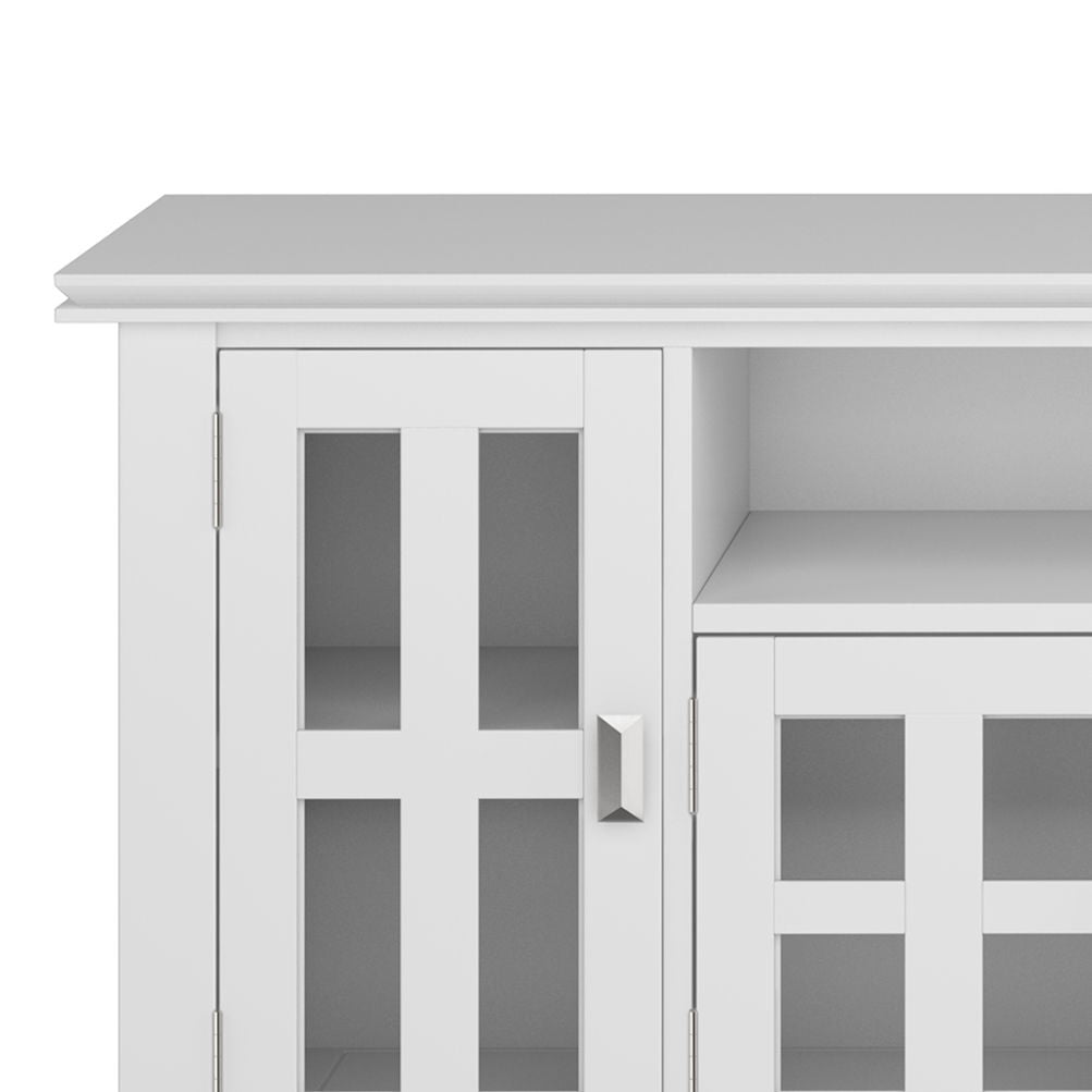 Close-up of the Artisan - TV Media Stand, showcasing white glass-paneled doors with silver handles, an upper shelf, and minimalist modern design elements.