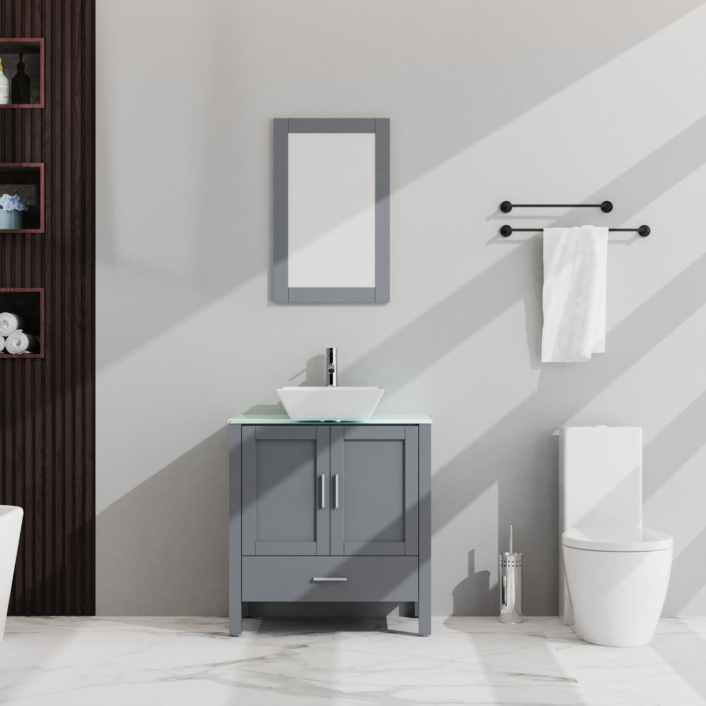 Modern bathroom featuring the Bathroom Vanity And Sink Combo Glass Top Cabinet With Mirror, a double towel rod above a white toilet, shelves and decor on the left wall, and sunlight casting diagonal shadows.