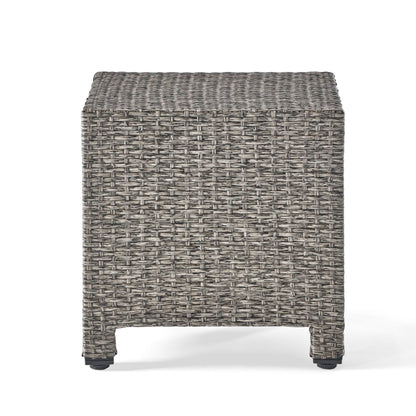 The Puerta Minimalist Style Accent Table features a light and dark gray woven wicker pattern, short legs, and a simple modern design, shown on a white background.