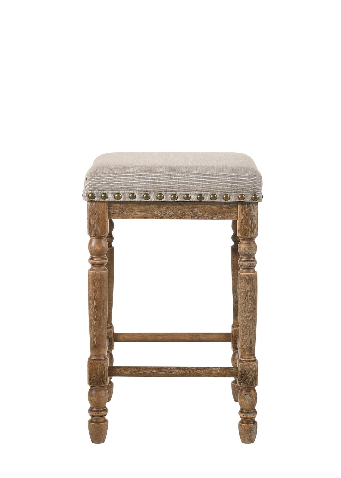 The Farsiris Weathered Counter Height Stool Set (2) in beige features turned wooden legs, a beige upholstered seat, and decorative metal studs along the edge, shown from the front against a white background.