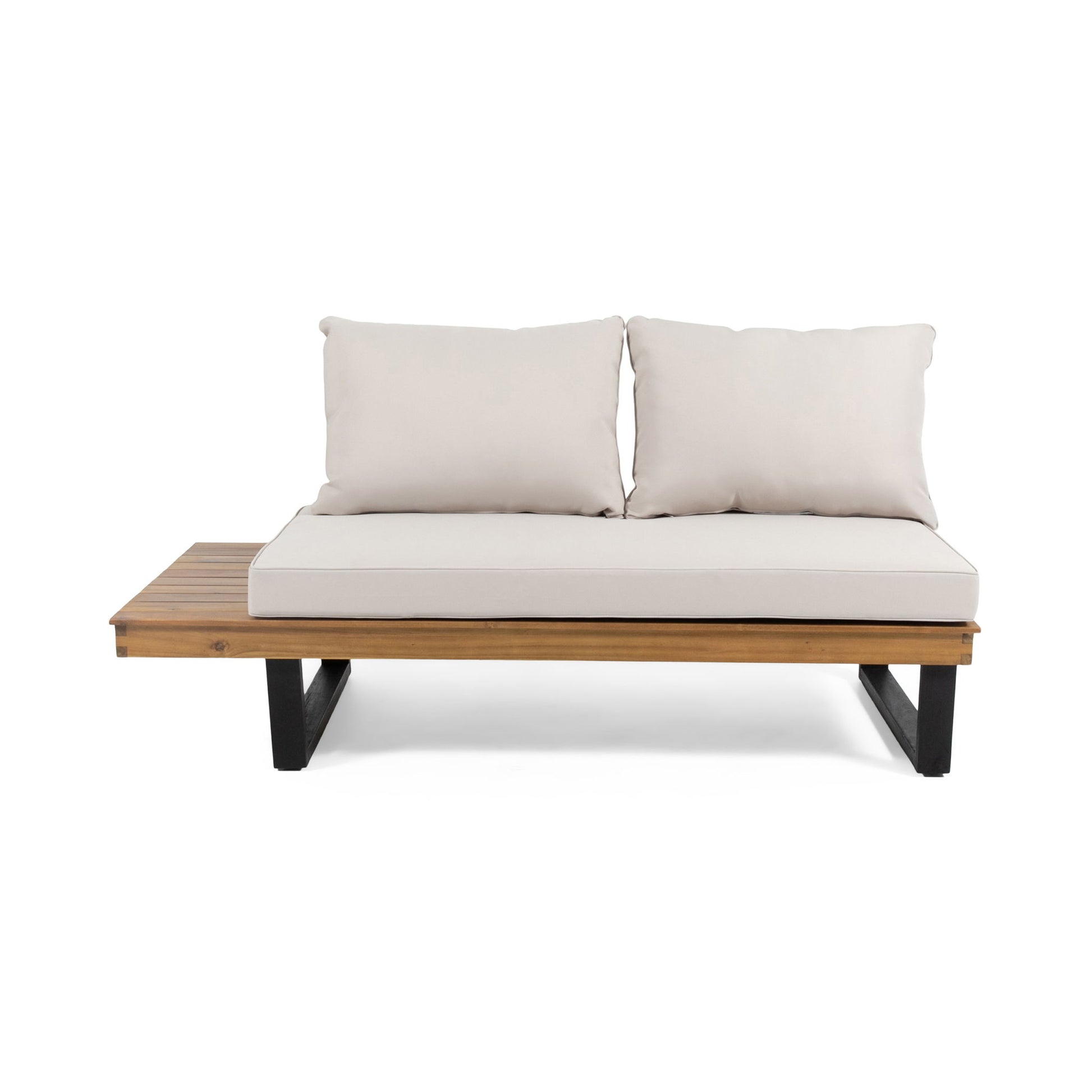 The Sebastian 2 Seater Sofa features beige cushions, a wooden seat, black metal legs, and an integrated wooden side table on the left for modern outdoor lounging.