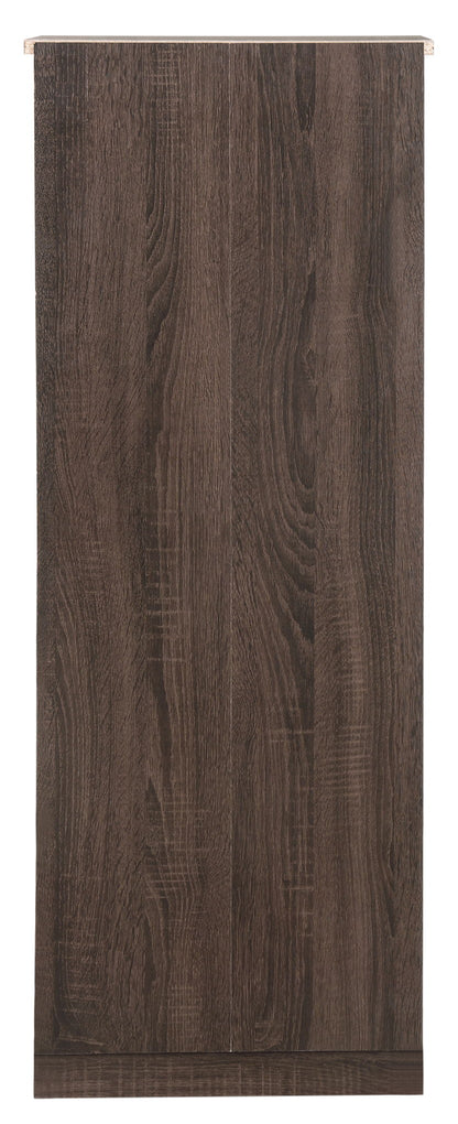 The Boston - Lingerie Chest features a tall, rectangular wooden design with a dark brown finish and visible wood grain, displayed against a white background.