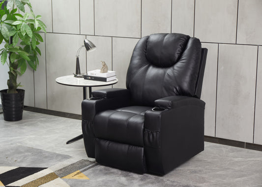 A Modern Recliner Chair With Cup Holders and remote control sits beside a round white side table holding a desk lamp, books, and a decorative object. A potted plant stands nearby against a tiled wall in this modern minimalist room.