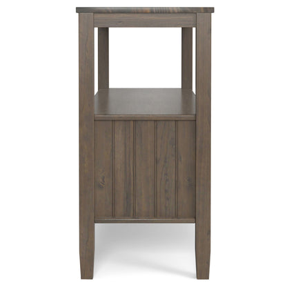 Side view of the Lev Console Table in Smoky Brown, featuring a shelf beneath the tabletop, a paneled lower section, and simple straight legs.