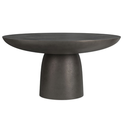 The Alexa Cast Aluminum Coffee Table features a modern design with a black finish, round wide top, and sturdy, tapered cylindrical pedestal base.