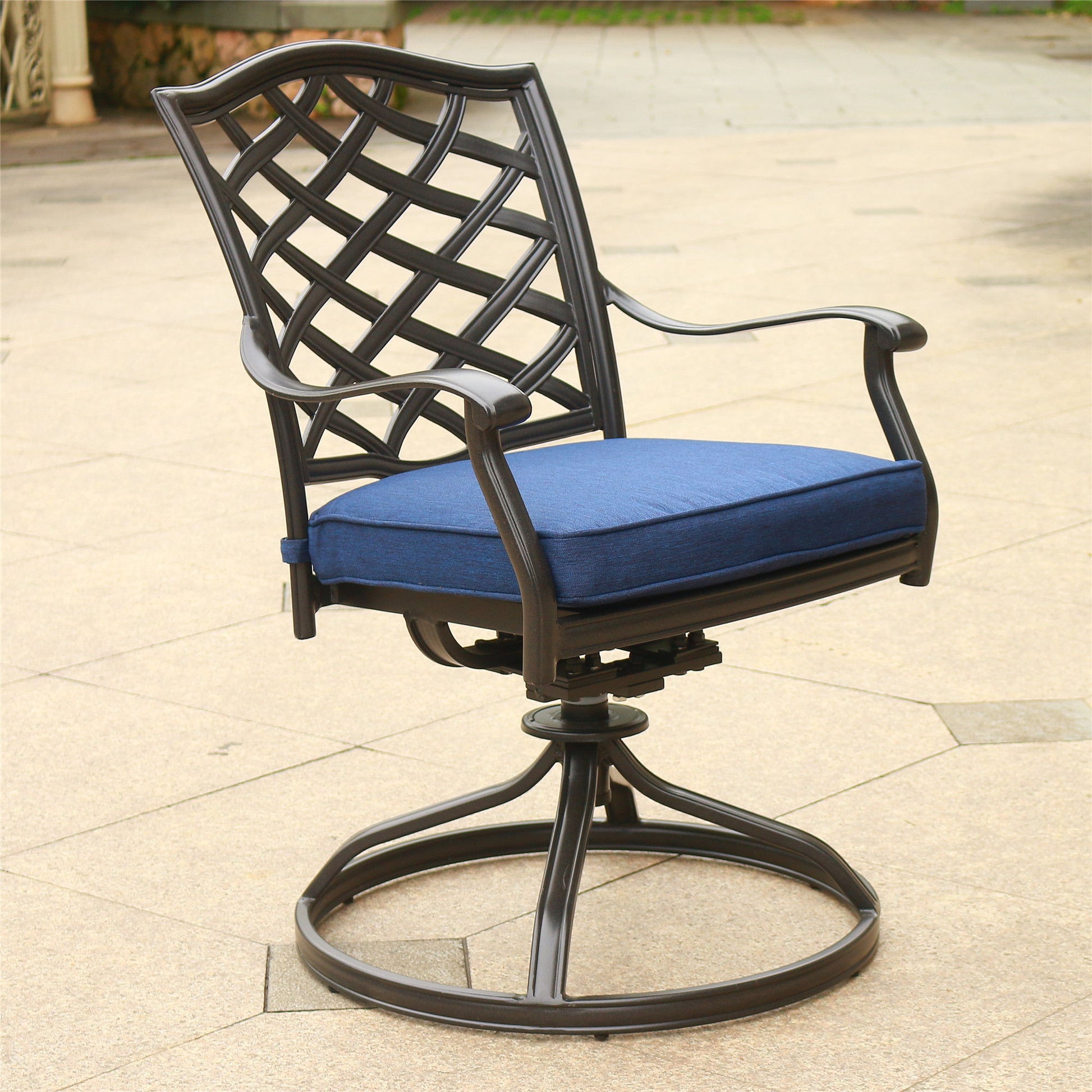 A set of two Outdoor Patio Aluminum Swivel Rocker Dining Chairs with blue cushions, featuring dark lattice-patterned backs and curved armrests, is placed on a paved outdoor surface.