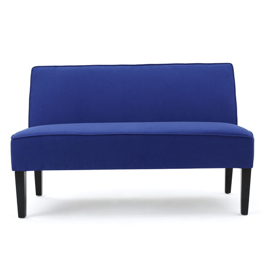 The Contemporary Loveseat features a royal blue upholstered seat and backrest, armless design, and stands on four straight black birch wood legs, all set against a plain white background.