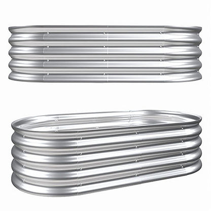 Two large, oval Heavy Duty Galvanized Raised Garden Bed Kits for vegetables, flowers & herbs with ribbed silver sides are displayed on a white background—one shown from the side, the other at an angle.