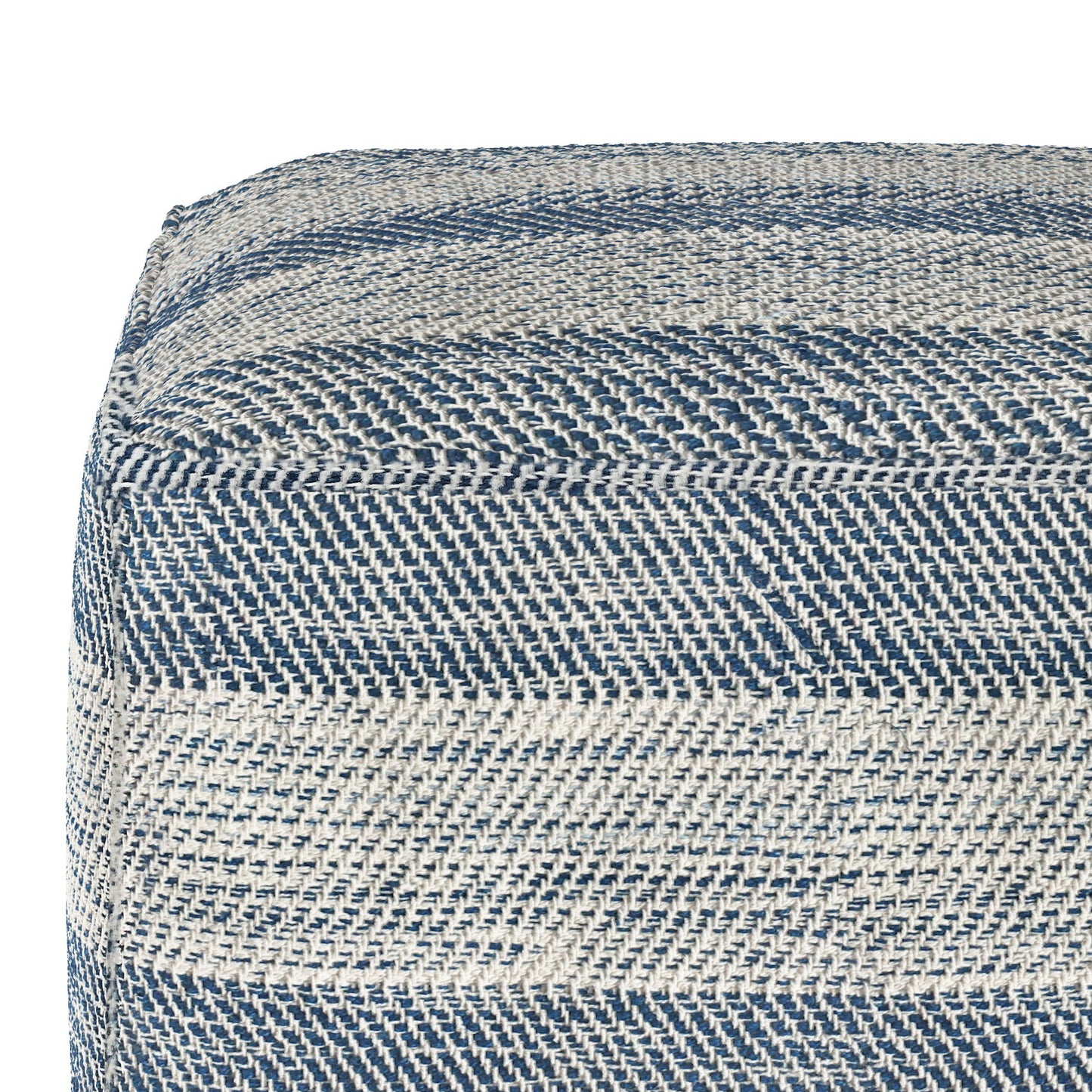 Close-up of the Clay - Square Pouf, Upholstered, featuring woven fabric with diagonal blue and white stripes that highlight the detailed texture and pattern of its material.