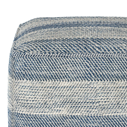 Close-up of the Clay - Square Pouf, Upholstered, featuring woven fabric with diagonal blue and white stripes that highlight the detailed texture and pattern of its material.