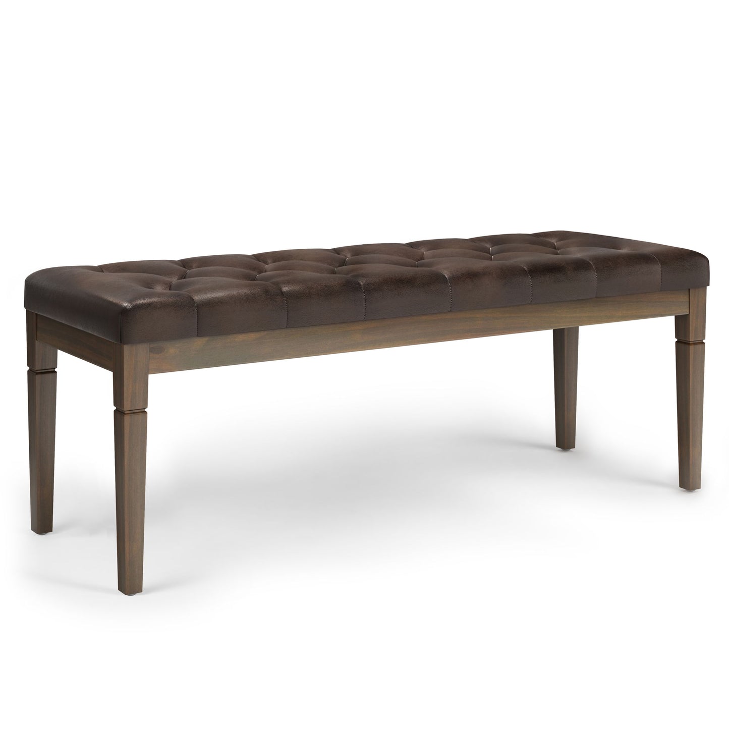 The Waverly - Upholstered Tufted Ottoman Bench features a dark brown tufted leather cushion and four wooden legs, displayed against a white background.