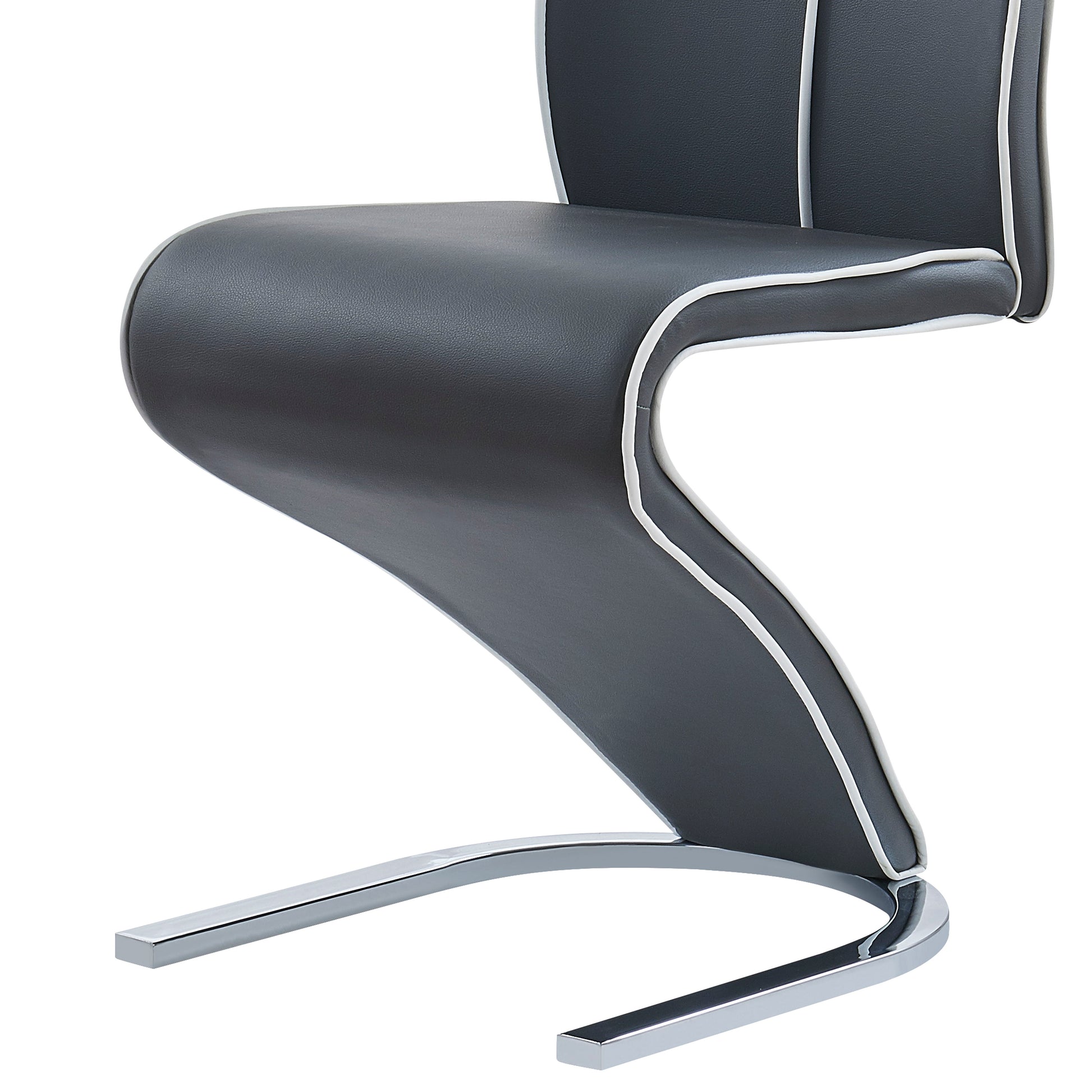 A modern set of two Couch.com Anne Dining Chairs with a durable design, dark gray faux leather, and a sleek contemporary style.