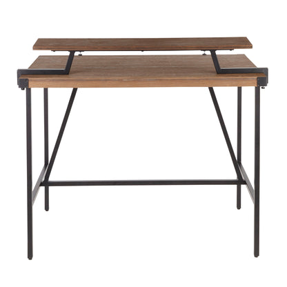 The Gia - Industrial Counter Table features a wooden top, black metal legs, and a raised shelf supported by black metal brackets. Its minimalist, modern design makes it a stylish addition to any space.