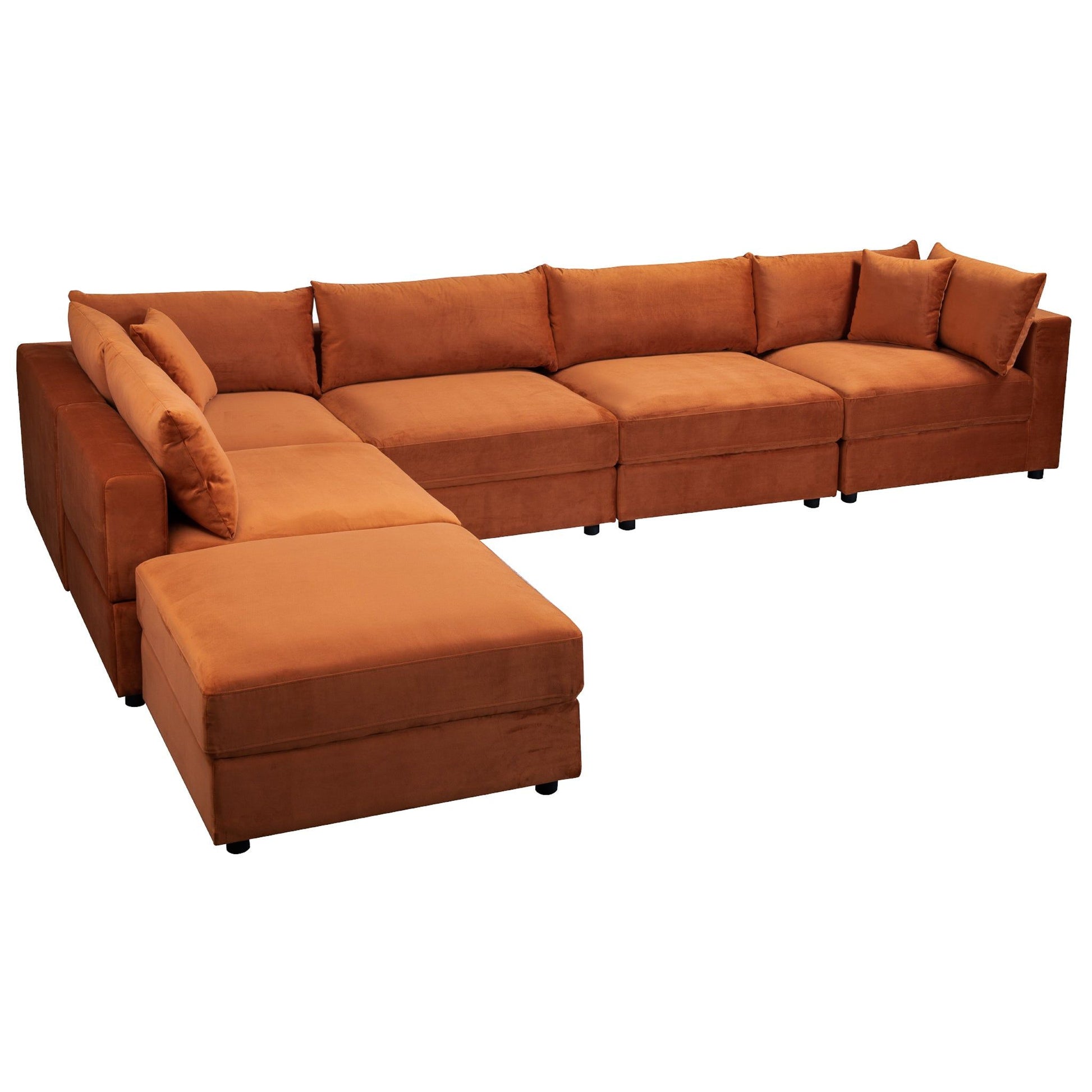 The Uptown Modular Sofa in burnt orange features an L-shaped design with multiple seat and back cushions, a left-side chaise lounge, and low blocky armrests.