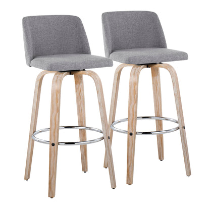 The Toriano Contemporary Fixed Height Barstools (set of 2) feature swivel seats, round chrome footrests, light wood legs, and grey upholstered seats and backs, shown side by side on a white background.