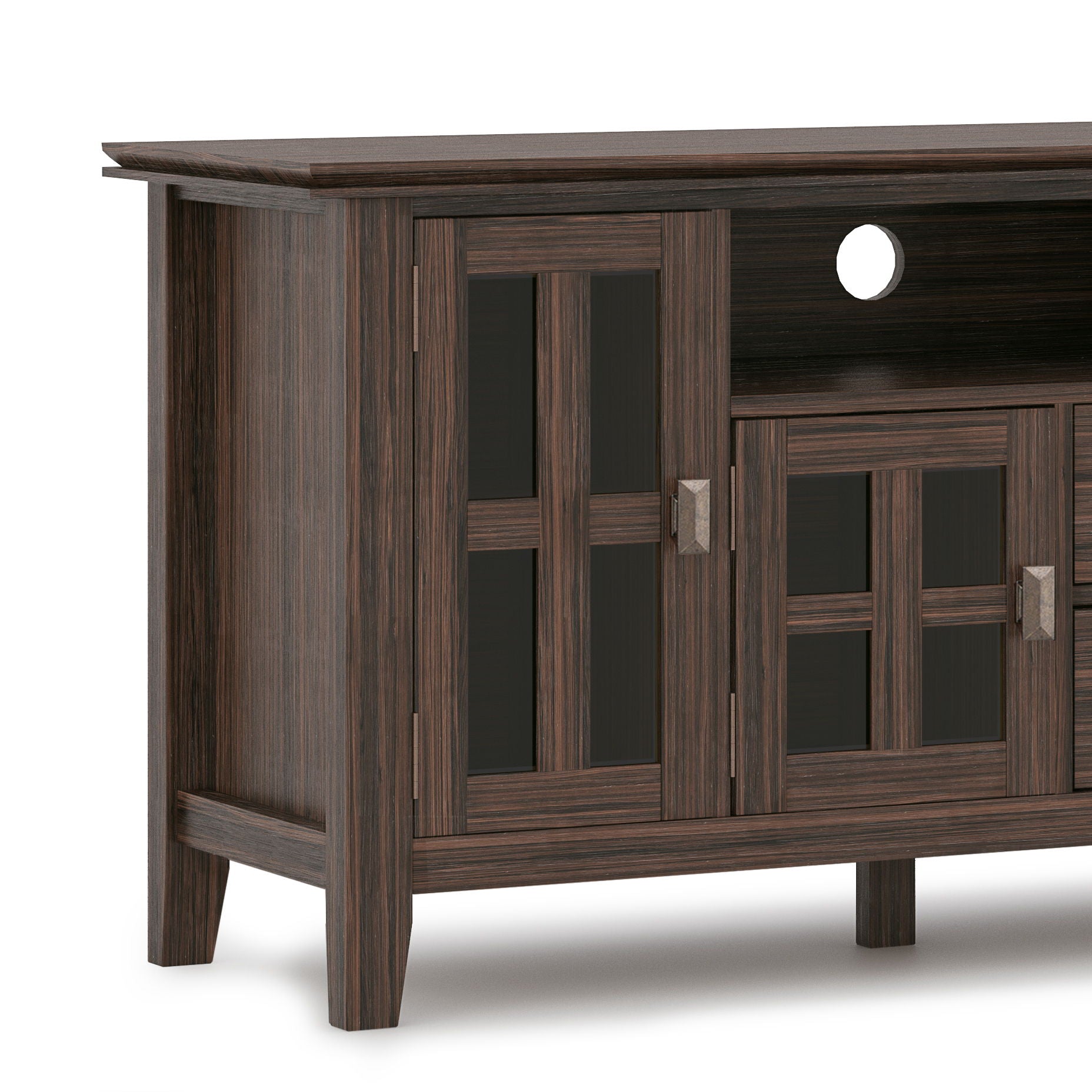 The Artisan TV Media Stand features a dark wood finish, glass-paneled cabinet doors with metal handles, an open shelf with a cable management cutout, modern clean lines, and sturdy legs for contemporary style and function.