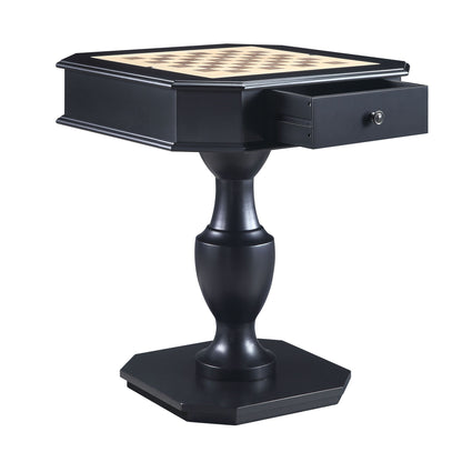 The Galini Game Table is a small black wooden chess table featuring a pedestal base, a built-in chessboard top, and a partially open side drawer for storage.