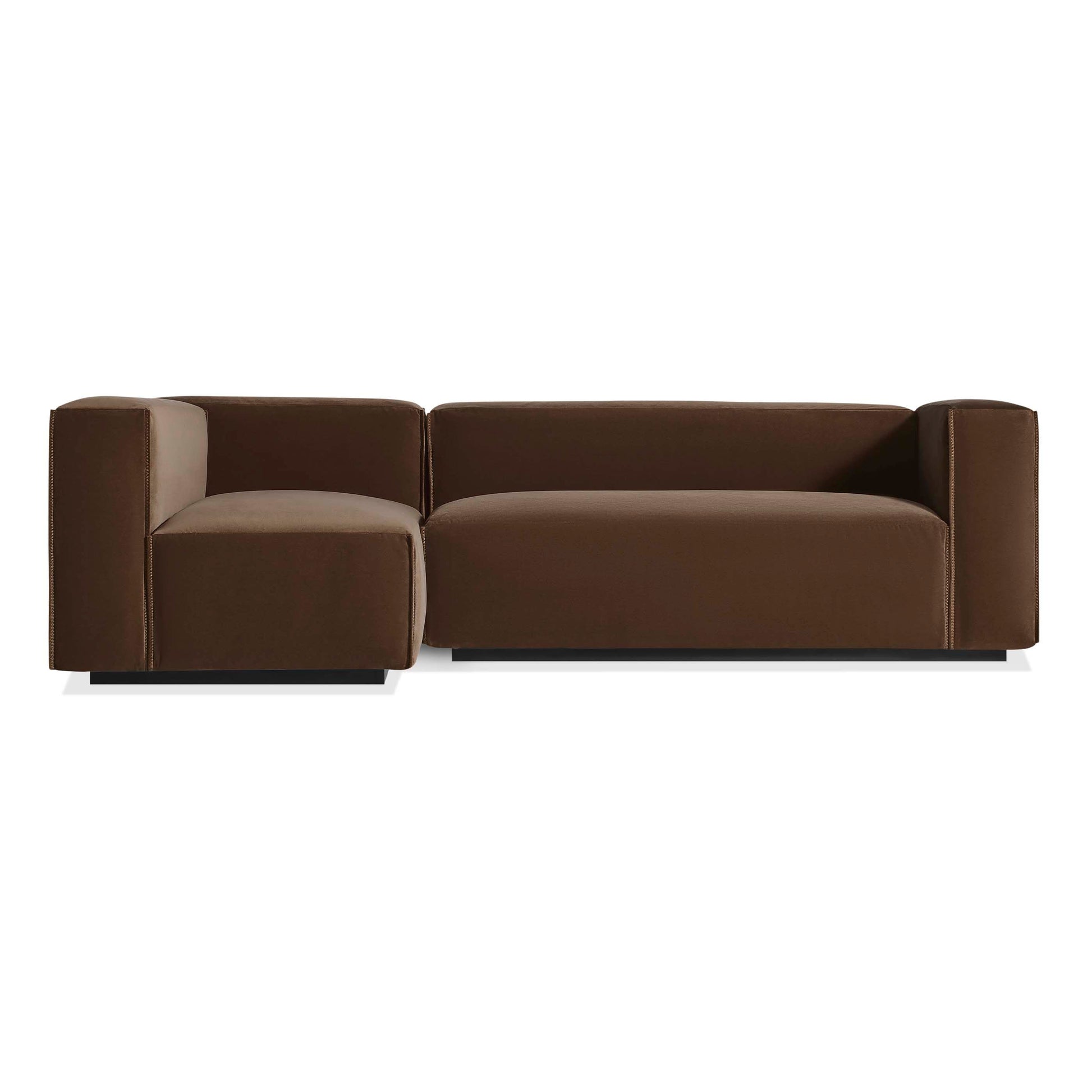 The Cleon Small Right Sectional Sofa, upholstered in coffee velvet, features a modern low-profile design with thick blocky arms and backrests, shown here against a plain white background.