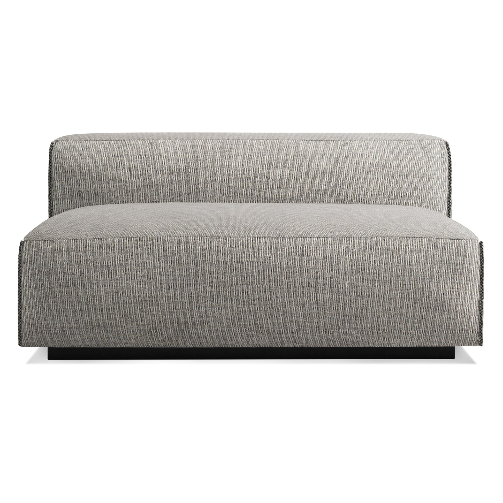 The Cleon Unarmed Sofa in Tait Charcoal features a modern, armless design with boxy lines and charcoal upholstery, displayed against a plain white background.