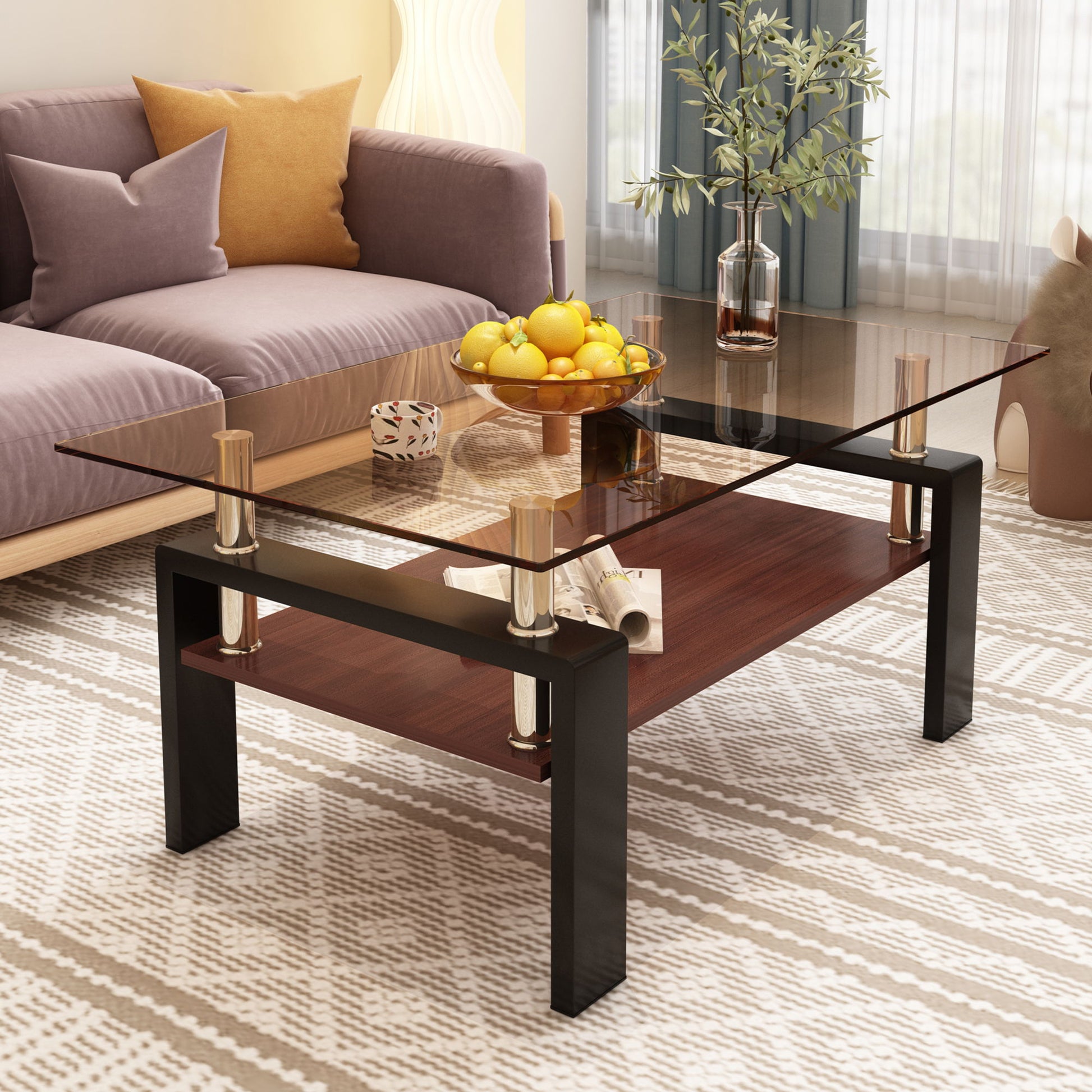 A modern living room features the Modern Rectangular Coffee Table With Tempered Glass Top, displaying a bowl of fruit, a magazine, and a decorative vase. A beige sofa with yellow and purple pillows sits atop a patterned rug.
