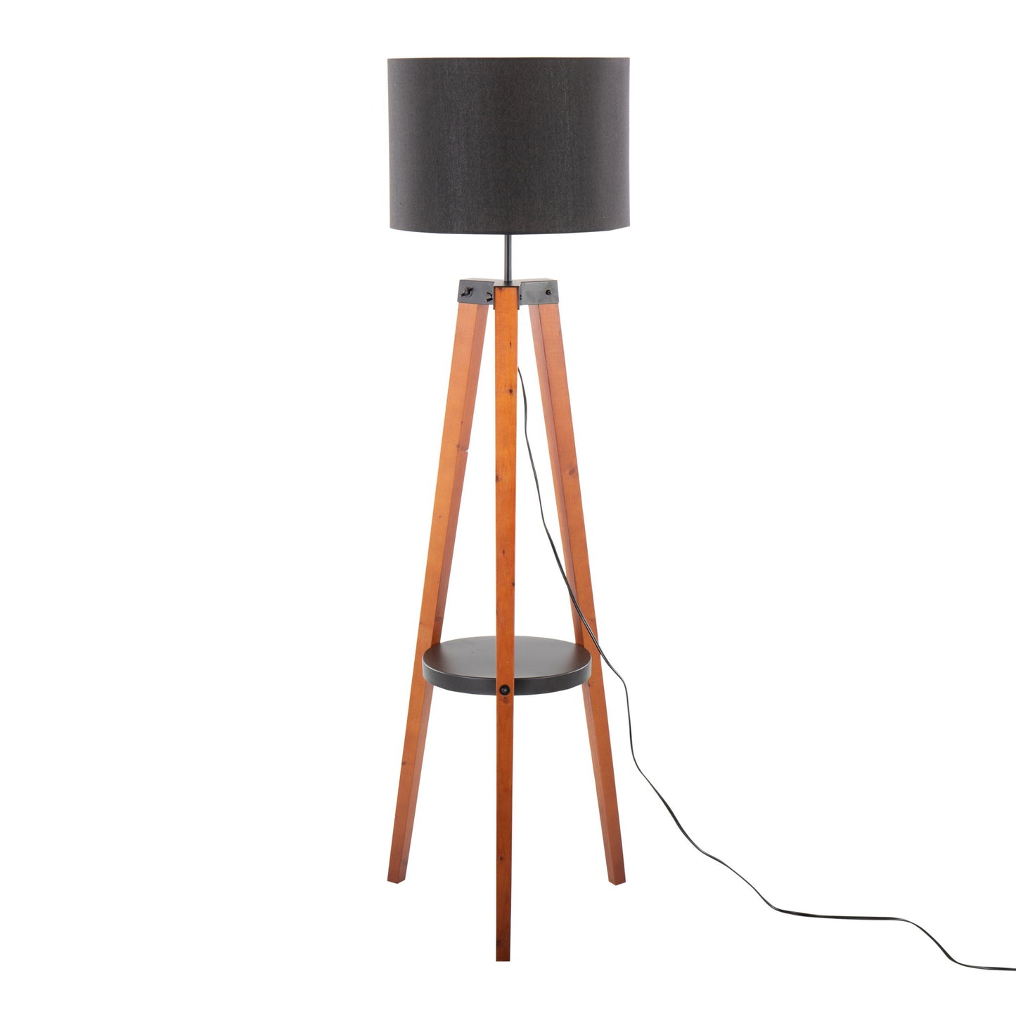 The Compass Mid Century Modern Floor Lamp features a black drum shade, wooden tripod legs, a round black shelf at the center, and a black power cord extending from its base.