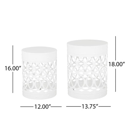 The Outdoor Metal S/2 End Table set includes two white cylindrical tables with open interlocking circle designs. The small table measures 16"H x 12"W; the large is 18"H x 13.75"W. Both tables are shown with dimensions labeled.