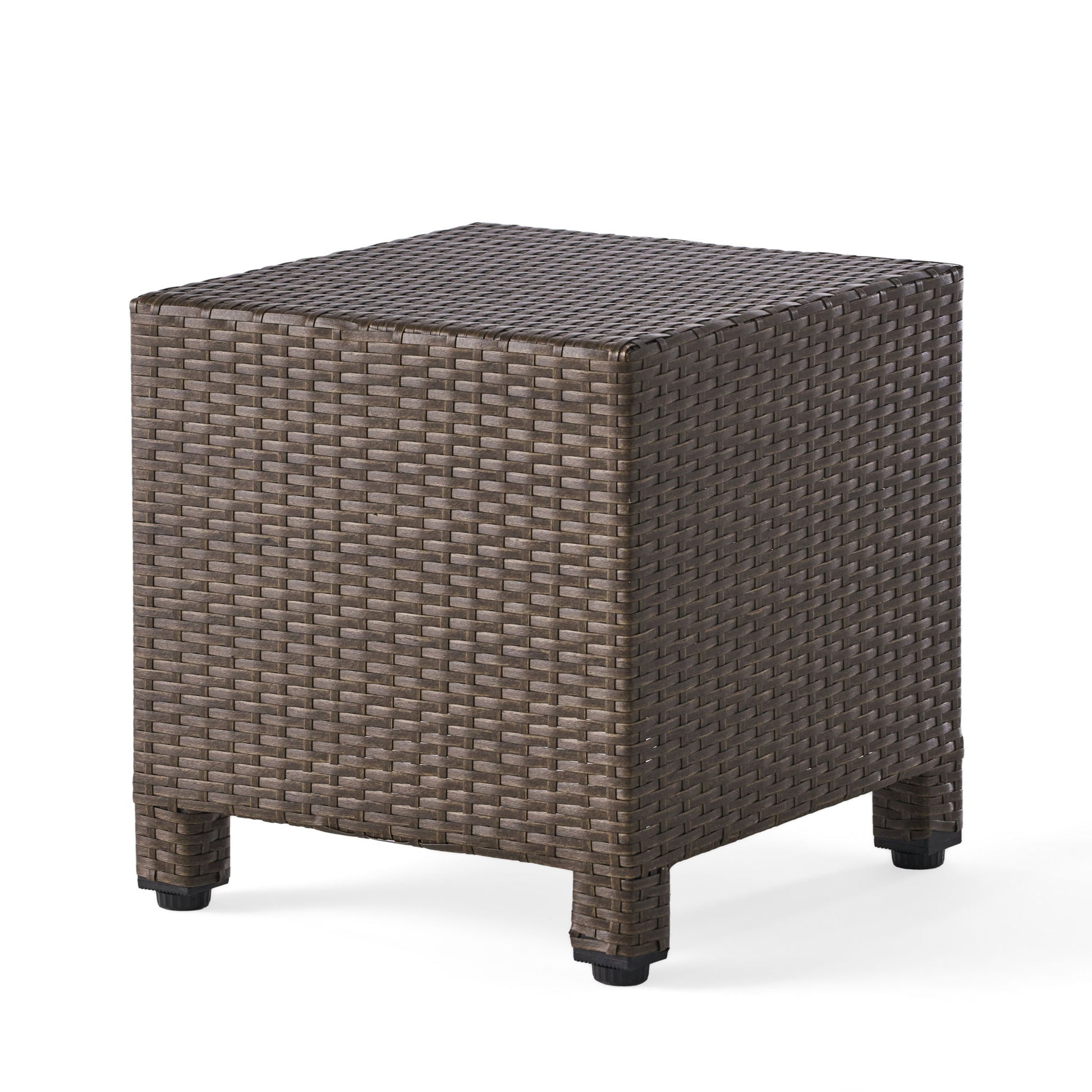 The Puerta Minimalist Style Accent Table features a square silhouette, woven brown rattan design, and short legs, shown against a plain white background.