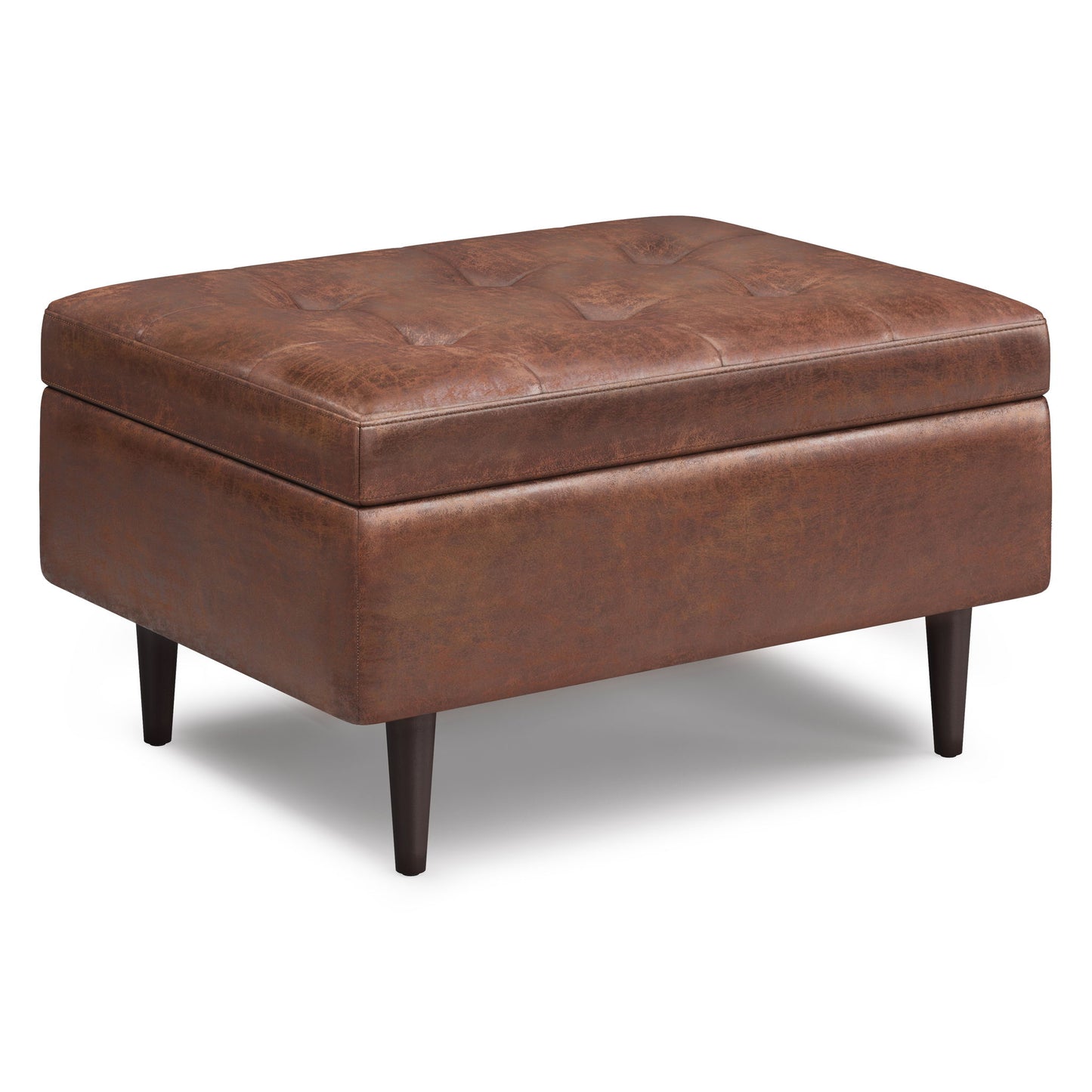 The Shay Large Square Coffee Table Storage Ottoman features brown tufted leather upholstery and tapered dark wood legs, shown against a white background in stylish mid-century design.
