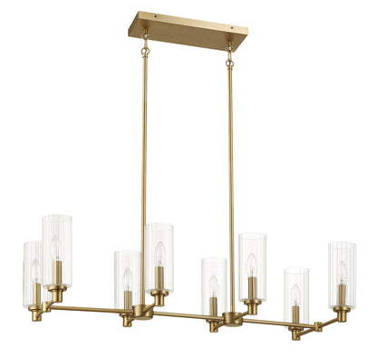 The Willow 8-Light Island features a modern rectangular chandelier in antique brass/gold, with clear ribbed pendant shades encasing candle-shaped bulbs, suspended by two rods from a rectangular ceiling mount.
