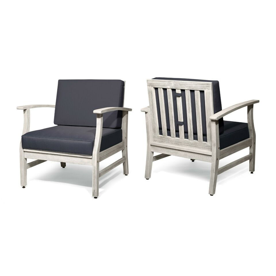 Two Perla Contemporary Club Chairs, featuring light gray wooden frames and dark gray water-resistant cushions, are displayed from the front and back on a white background.