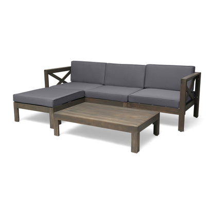 The Alcove - L Shape Sofa Set features a wooden outdoor sectional with gray cushions, an attached chaise lounge, and a matching low rectangular coffee table.