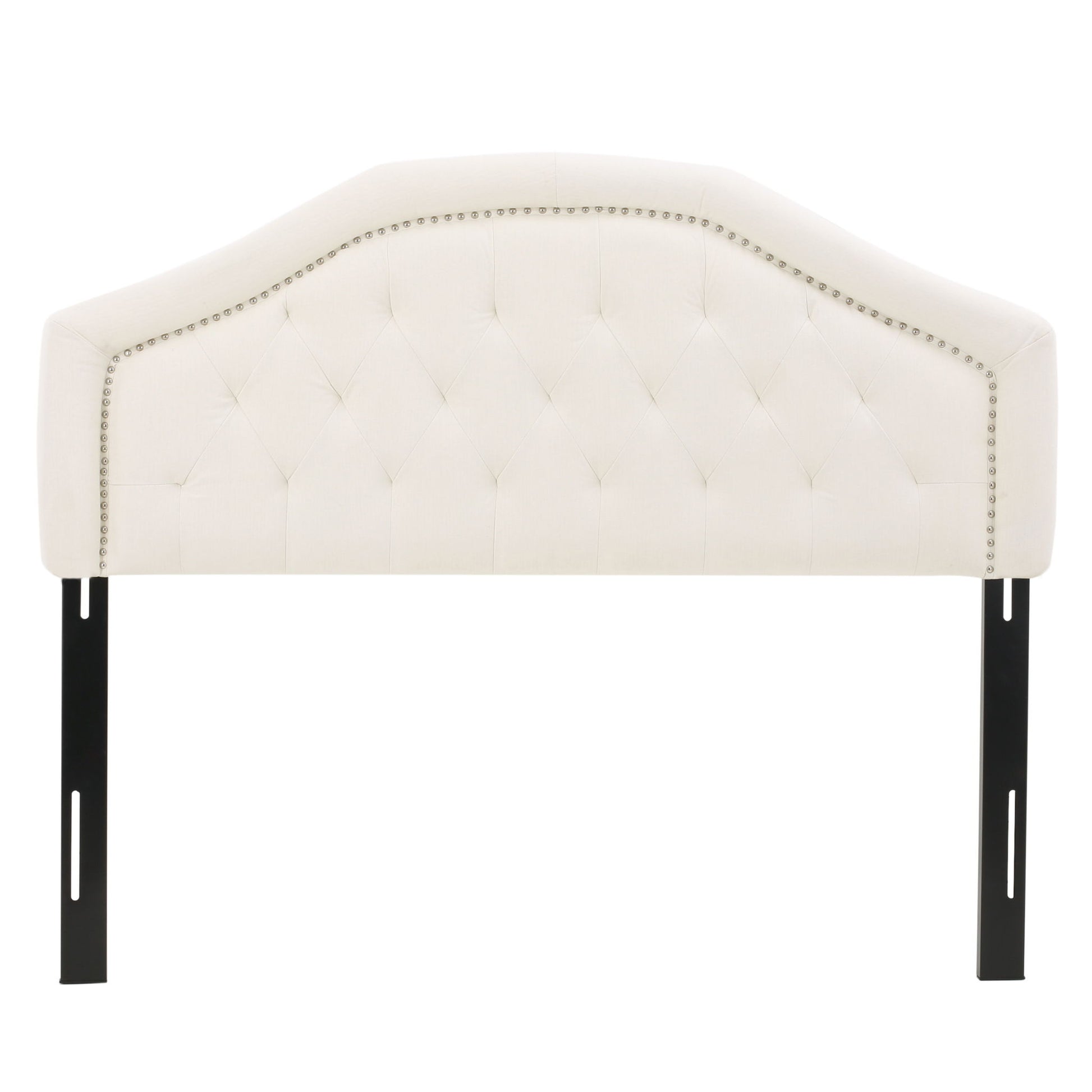 The Kaarina Contemporary Tufted Fabric Headboard features cream-colored upholstery, a curved top, silver nailhead trim, tufted design, and two black metal support legs.