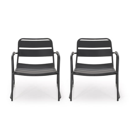 Two Conrad Outdoor Chairs with wide seats, black metal frames, horizontal backrest slats, and curved armrests are placed side by side on a white background.