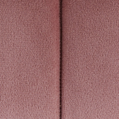 Close-up of the Braided - Versatile Round Ottoman, showing its soft pink textured fabric surface with a vertical seam down the center.