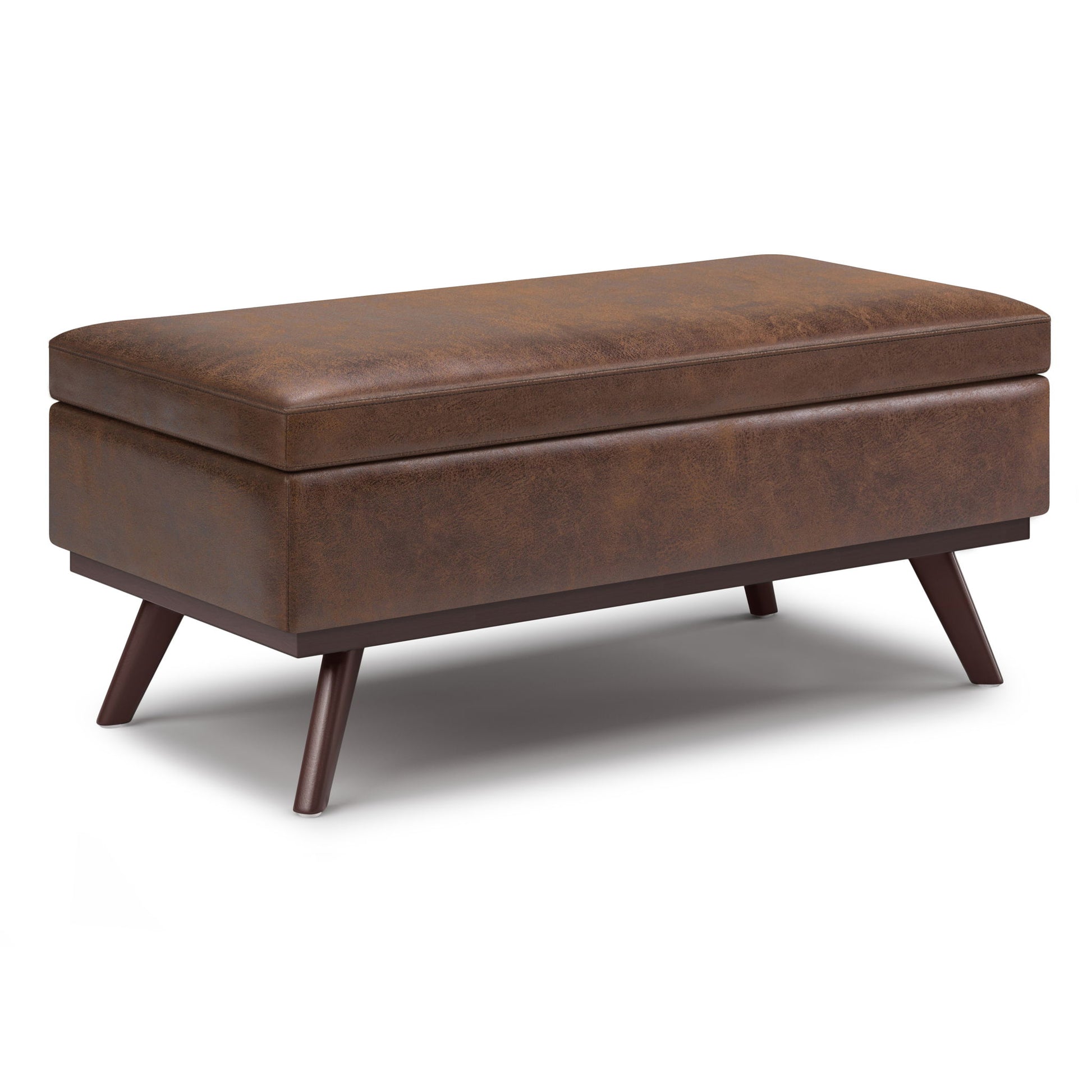 The Owen Lift Top Large Coffee Table Storage Ottoman features a rectangular brown leather design, cushioned top, angled wooden legs, and mid-century style.