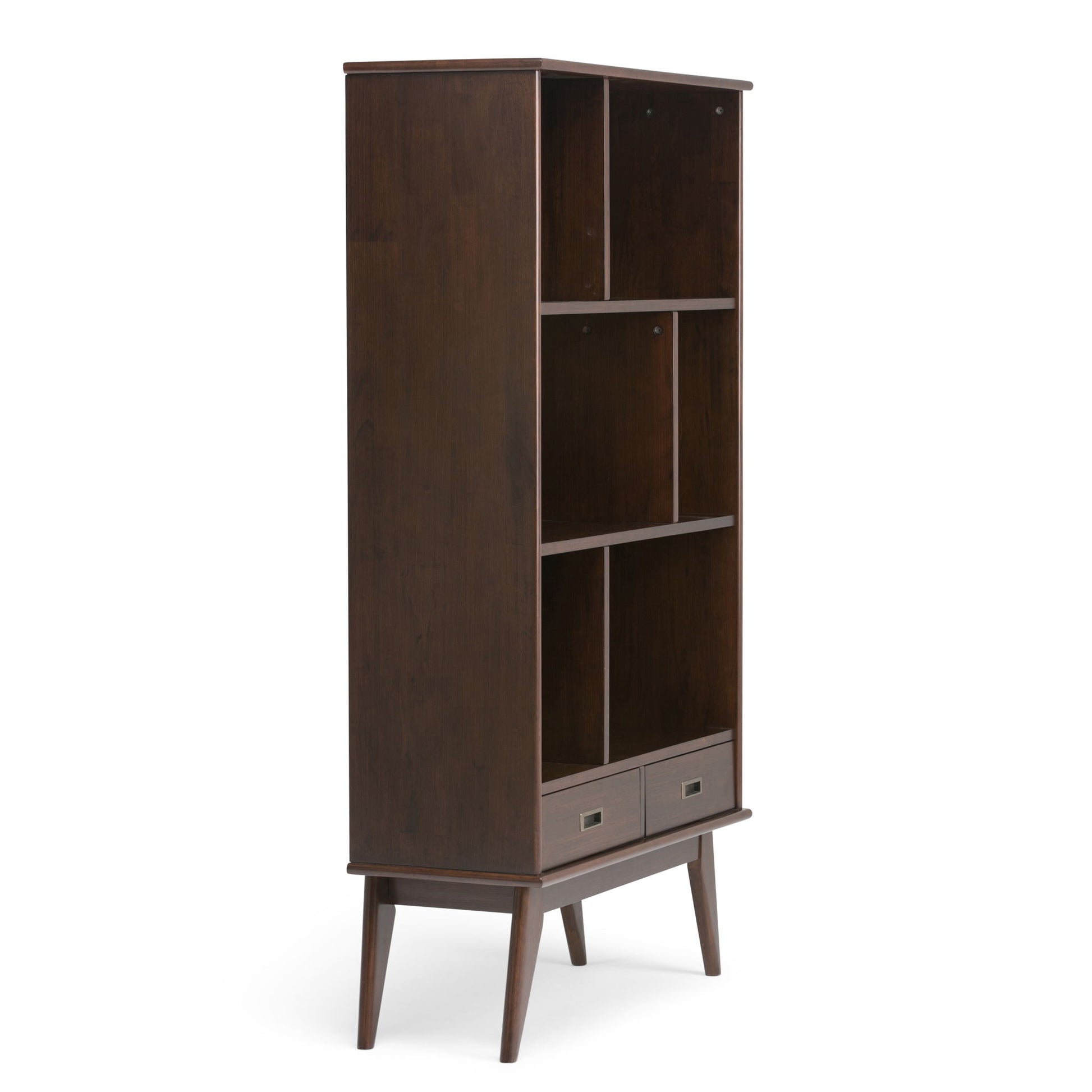 The Draper - Mid Century Wide Bookcase and Storage Unit features a tall, dark wood design with three open shelves, two small bottom drawers, and angled legs for a modern mid-century look.